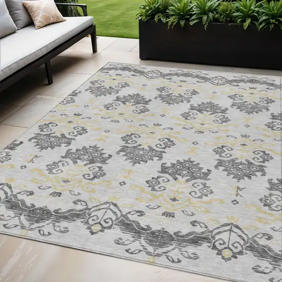 Charcoal Silver And Gold Oriental Washable Indoor Outdoor Area Rug Photo 1