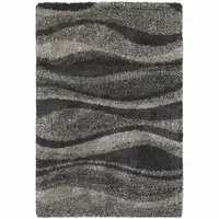Photo of Charcoal Silver And Grey Abstract Shag Power Loom Stain Resistant Area Rug