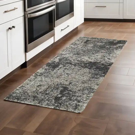 2' X 8' Charcoal Silver And Grey Abstract Shag Power Loom Stain Resistant Runner Rug Photo 1
