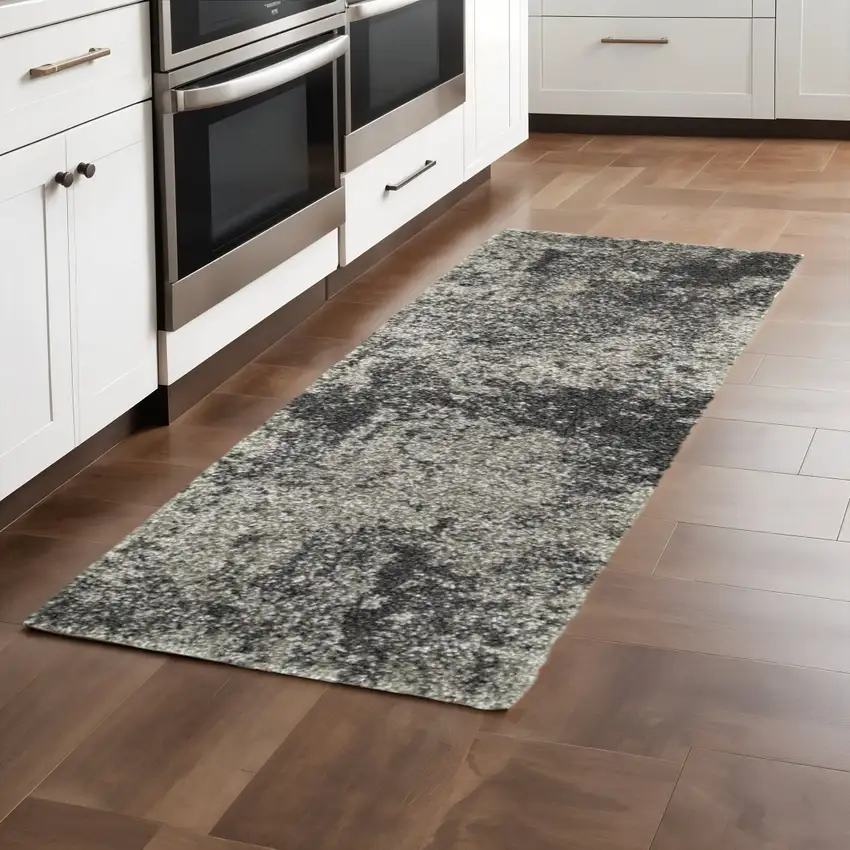 2' X 8' Charcoal Silver And Grey Abstract Shag Power Loom Stain Resistant Runner Rug Photo 1