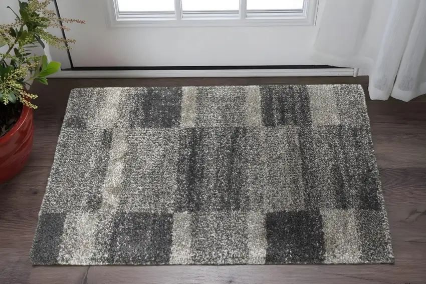 Charcoal Silver And Grey Geometric Shag Power Loom Stain Resistant Area Rug Photo 1