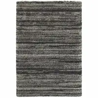 Photo of Charcoal Silver And Grey Geometric Shag Power Loom Stain Resistant Area Rug