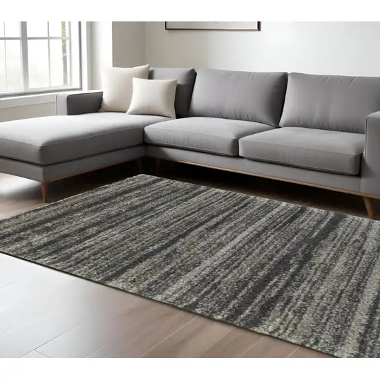 6' X 9' Charcoal Silver And Grey Geometric Shag Power Loom Stain Resistant Area Rug Photo 1