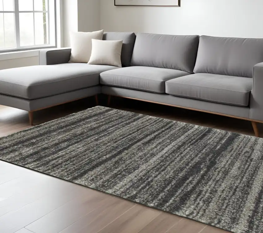 6' X 9' Charcoal Silver And Grey Geometric Shag Power Loom Stain Resistant Area Rug Photo 1