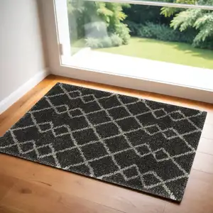 Photo of Charcoal and Ivory Geometric Shag Area Rug