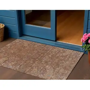 Photo of Chili Red And Copper Medallion Washable Indoor Outdoor Area Rug