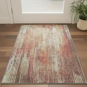 Photo of Chili Red And Ivory Striped Washable Area Rug With UV Protection