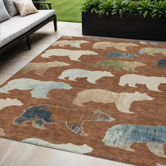 Chili Red Ivory And Beige Animal Print Washable Indoor Outdoor Area Rug Photo 1