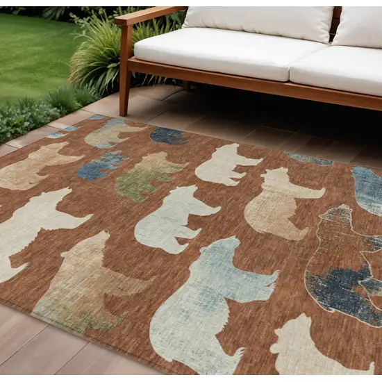 Chili Red Ivory And Beige Animal Print Washable Indoor Outdoor Area Rug Photo 1