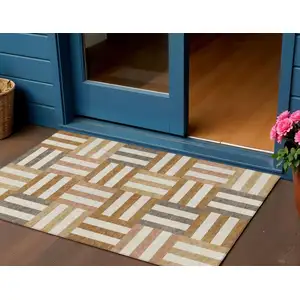 Photo of Chili Red Ivory And Copper Geometric Washable Indoor Outdoor Area Rug