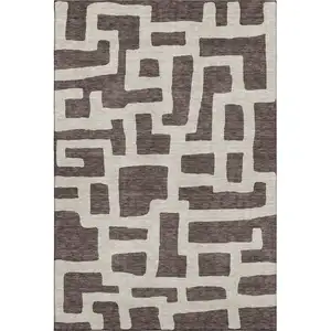 Photo of Chocolate And Beige Abstract Geometric Washable Area Rug With UV Protection