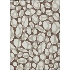 Photo of Chocolate And Beige Abstract Washable Indoor Outdoor Area Rug