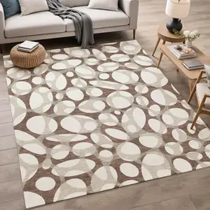 Photo of Chocolate And Beige Abstract Washable Indoor Outdoor Area Rug