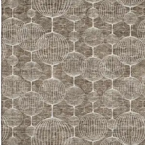 Photo of Chocolate And Beige Geometric Washable Area Rug With UV Protection