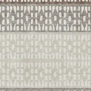 Photo of Chocolate And Beige Geometric Washable Area Rug With UV Protection