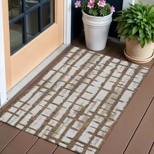 Photo of Chocolate And Beige Striped Washable Indoor Outdoor Area Rug