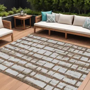 Photo of Chocolate And Beige Striped Washable Indoor Outdoor Area Rug