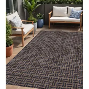 Photo of Chocolate And Black Geometric Washable Indoor Outdoor Area Rug