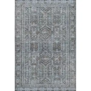 Photo of Chocolate And Blue Geometric Washable Area Rug With UV Protection