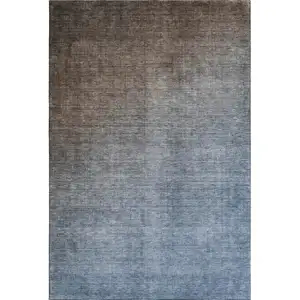 Photo of Chocolate And Blue Ombre Washable Area Rug With UV Protection