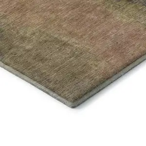 Photo of Chocolate And Copper Abstract Washable Area Rug With UV Protection