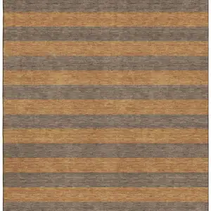 Photo of Chocolate And Copper Striped Washable Area Rug With UV Protection