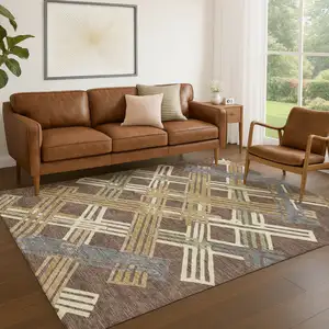 Photo of Chocolate And Gold Geometric Washable Indoor Outdoor Area Rug