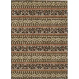 Photo of Chocolate And Gold Striped Washable Indoor Outdoor Area Rug