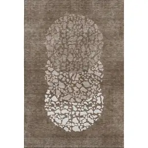 Photo of Chocolate And Ivory Abstract Washable Area Rug With UV Protection