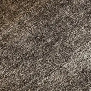 Photo of Chocolate And Ivory Abstract Washable Area Rug With UV Protection