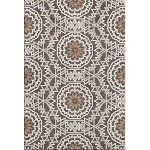 Photo of Chocolate And Ivory Geometric Washable Area Rug With UV Protection
