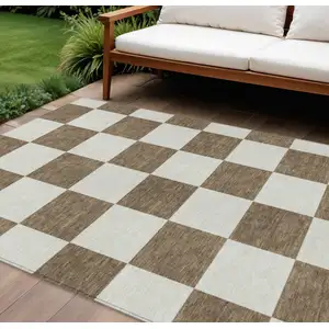 Photo of Chocolate And Ivory Geometric Washable Indoor Outdoor Area Rug