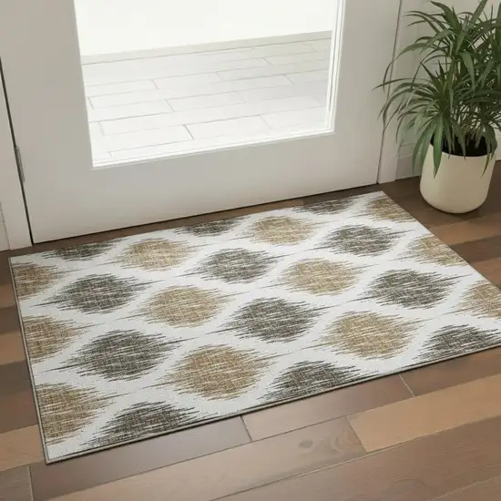 Chocolate And Ivory Ikat Washable Area Rug With UV Protection Photo 1