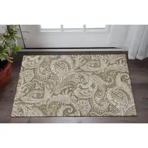 Photo of Chocolate And Ivory Paisley Washable Area Rug With UV Protection