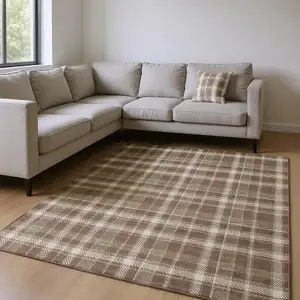 Photo of Chocolate And Ivory Plaid Washable Area Rug With UV Protection
