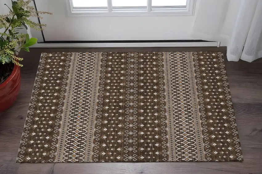Chocolate And Ivory Tribal Washable Area Rug With UV Protection Photo 2