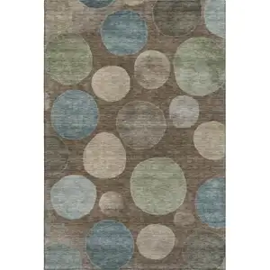 Photo of Chocolate And Teal Geometric Washable Area Rug With UV Protection