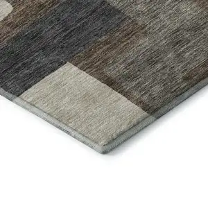 Photo of Chocolate Beige And Black Abstract Geometric Washable Area Rug With UV Protection