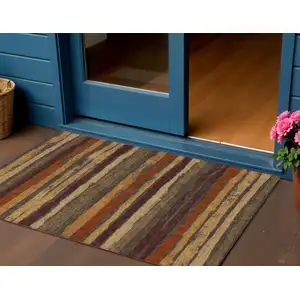 Photo of Chocolate Beige And Copper Striped Washable Indoor Outdoor Area Rug