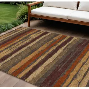 Photo of Chocolate Beige And Copper Striped Washable Indoor Outdoor Area Rug