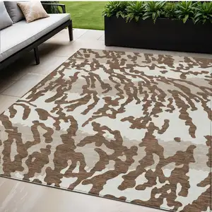 Photo of Chocolate Beige And Ivory Animal Print Washable Indoor Outdoor Area Rug