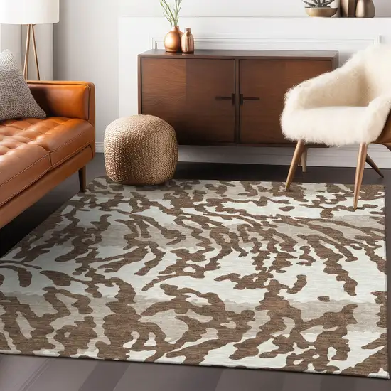 Chocolate Beige And Ivory Animal Print Washable Indoor Outdoor Area Rug Photo 8