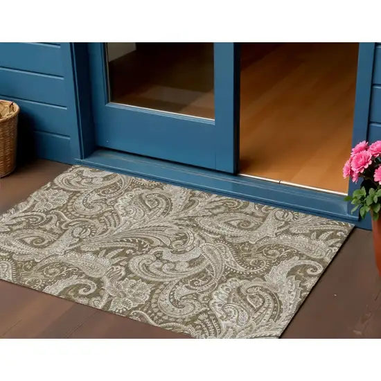 Chocolate Beige And Ivory Paisley Washable Indoor Outdoor Area Rug Photo 1