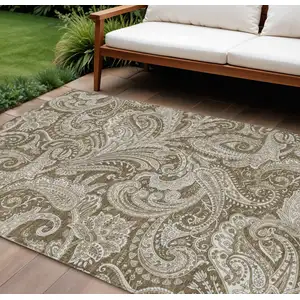 Photo of Chocolate Beige And Ivory Paisley Washable Indoor Outdoor Area Rug