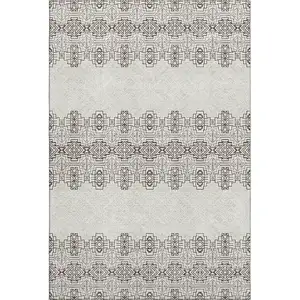 Photo of Chocolate Beige And Ivory Southwestern Washable Area Rug With UV Protection