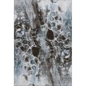 Photo of Chocolate Blue And Gray Abstract Washable Area Rug With UV Protection