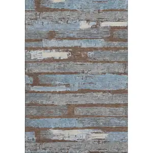 Photo of Chocolate Blue And Gray Striped Washable Area Rug With UV Protection