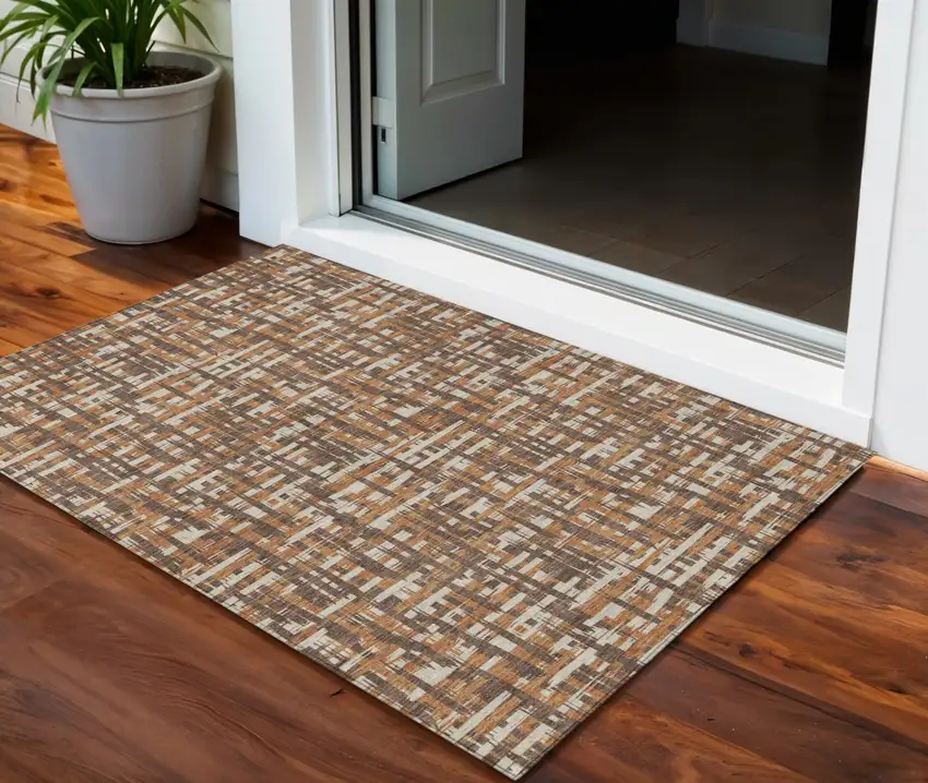 Chocolate Copper And Beige Abstract Washable Indoor Outdoor Area Rug Photo 1