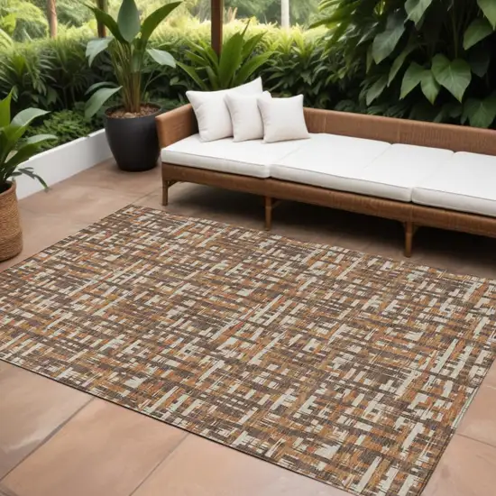 Chocolate Copper And Beige Abstract Washable Indoor Outdoor Area Rug Photo 1