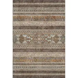 Photo of Chocolate Copper And Ivory Southwestern Washable Area Rug With UV Protection